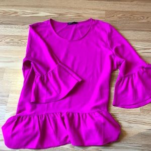 Pink peplum top